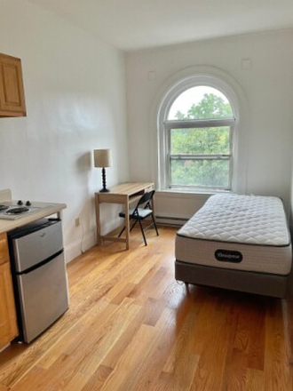 Visit hubrealtyproperties.com - South Campus, light and bright beautiful studio with big window