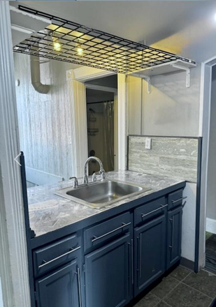 open kitchen - Cute, Artsy 2 bedroom next to campus! Across from Plaza, above Ninja grill! Duplex