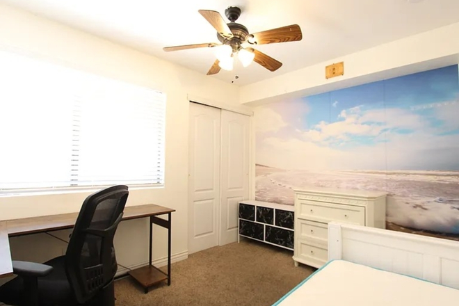 Bedroom 1 (carpet replaced with hard flooring) - The Village at University Heights Apartments