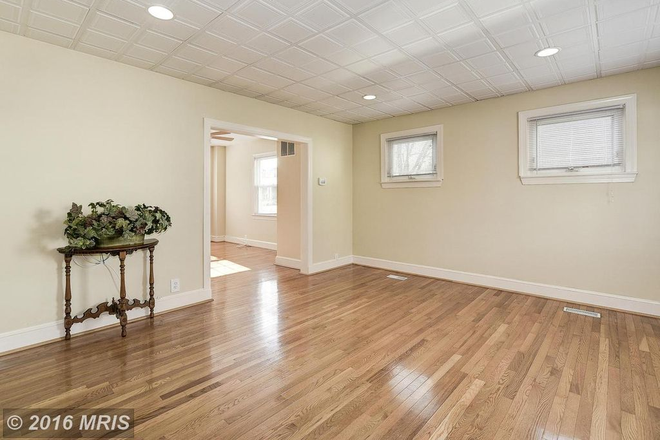 Living Room - Burke Avenue Spacious & Well-Maintained 4 Bedroom 2 Bath Property with Parking Pad (Available Now!) House