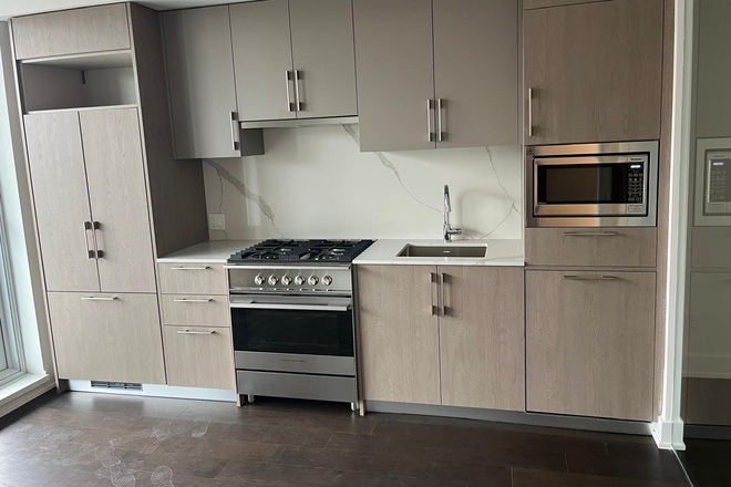 Kitchen - High-end Kitchen appliances - Stunning new 1 bedroom with balcony, high-end appliances, amazing amenities, steps to subway & more.