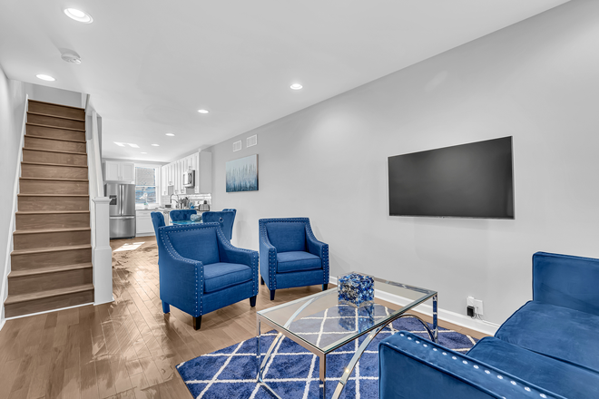 Living room - opposite view - Furnished Living with A Private Parking Pad and Four Blocks From Johns Hopkins Hospital! Townhome