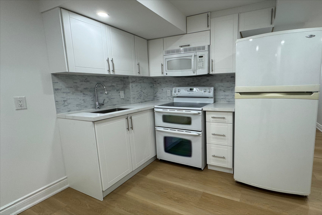 Kitchen - One bedroom + Den (Can fit bed) Separate Entrance Basement Apartment ; direct bus availabl