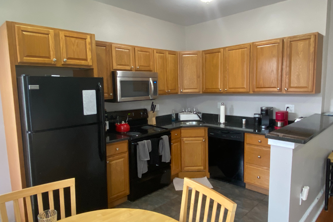 kitchen - 1066 Commonwealth Ave - CLOSE TO WEST CAMPUS, BABCOCK TRAIN STOP & STAR MARKET!! Apartments