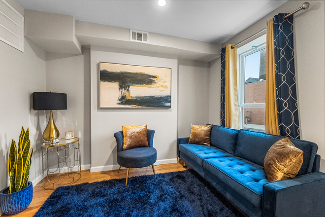 Living Room - Perfect for Students with Parking Four Blocks From Johns Hopkins Townhome