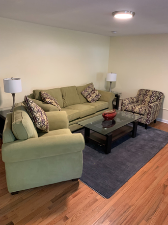 Living Room - Beautifully Modern & Just Renovated 6BR/3BA Available for June 1 (2026-27 School Year) Townhome