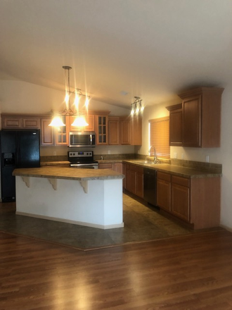 Kitchen with spacious counters - Newer 3 bed-2 bath home.  Includes utilities and lawn care.