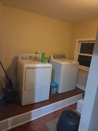 Laundry area, to the right of the back door - Spacious Three Bed Apartment with two rooms available to rent