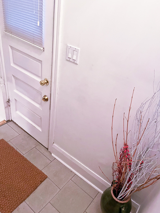 Front hallway - Downtown Location! Bright 2-bedroom basement apt fully furnished all included at St. Clair & Oakwood
