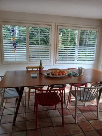 dining area - Large, light-filled, quiet, simply furnished townhome, garden and cat included
