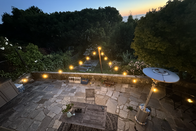Patio (redone from this recently) and yard at sunset! - 2-bed, 1 ba apartment in the hills with incredible view (Golden Gate, Mt Tam)