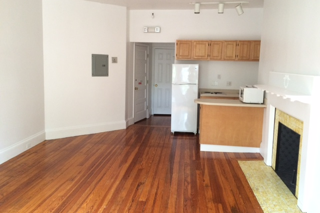 LIVING ROOM - OPEN CONCEPT ONE BEDROOM APT WITH HARDWOOD FLOORS AT 1077 BEACON STREET IN BROOKLINE AVAIL. 9/1/2026