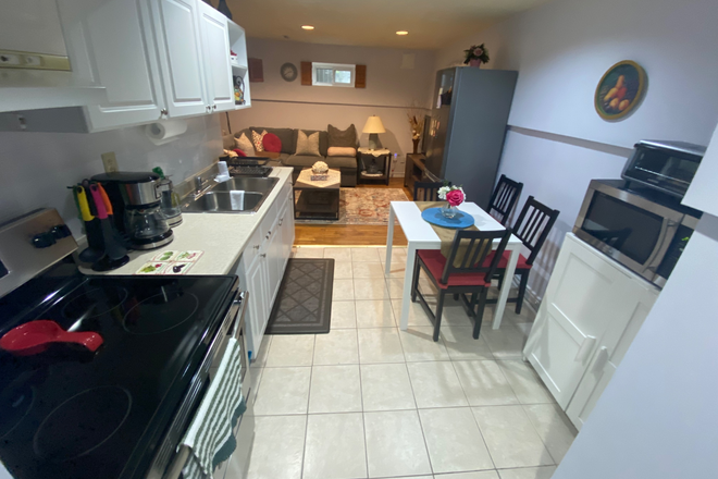 Full kitchen; includes utensils, pots, pans, plates/bowls, coffee maker, microwave, toaster. - Fully-Furnished Basement Apartment Fully Furnished Basement Suite All Utilities Incl.