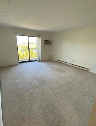 Living room - One-bedroom apartment available in Quincy Center starting November 1