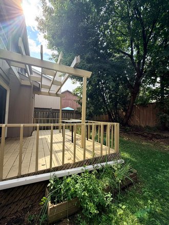 Backyard deck - A Bright,  Furnished Room; in a lovely quiet house, utilities and internet.