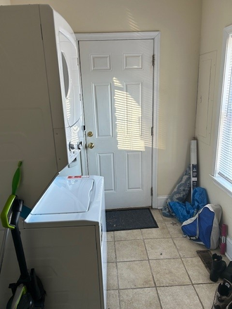 utility area with washer/dryer - 815 N Harrison Street Apartments