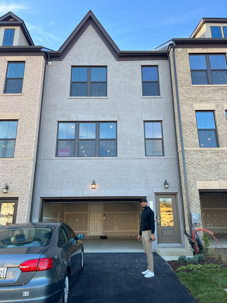 Front of home with garage and driveway - Looking for roommates in large, new townhouse