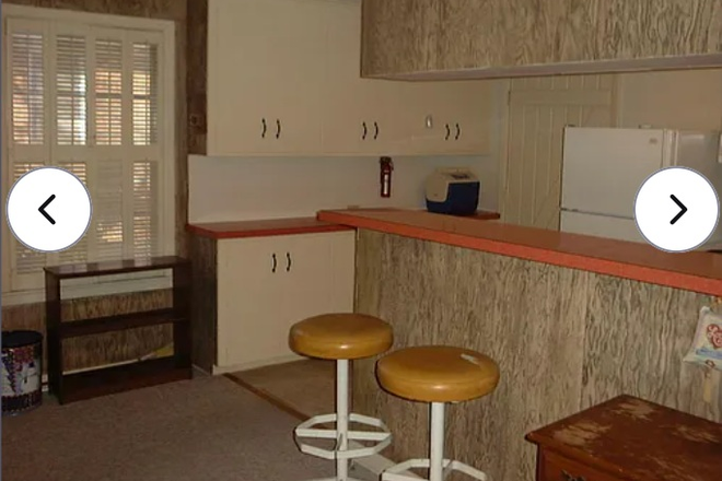 View of front door and kitchen area - Quaint garage, studio unit; about 1/4 mile from campus. Apartments