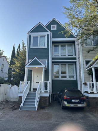 Front of 5 Ambrose Alley with parking space to right of stairs - HARLESTON GREEN TH AVAILABLE AUGUST 1, 2026
