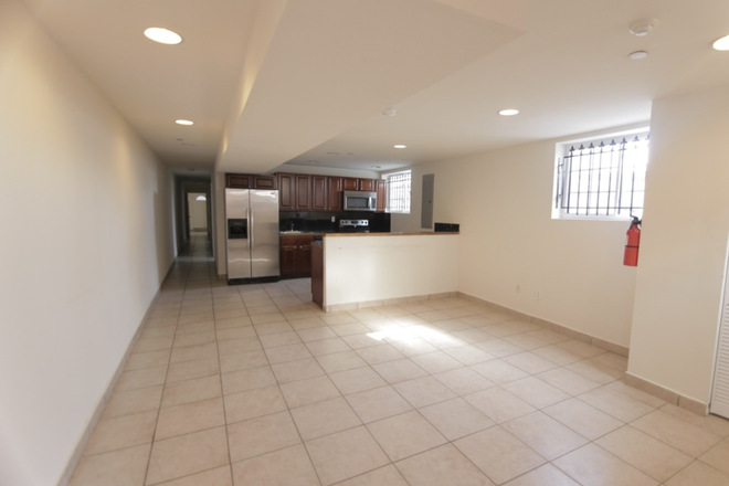 Living room (entryway behind image) - Off Campus Housing, Close to Campus Townhome