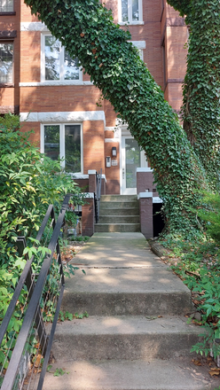 Front door of condo unit - La Maison, two story street level condo with parking space.  Ideal for 2 singles or small family.