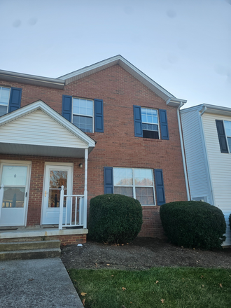 Front of Townhome - 4 Bedroom 2.5 bathroom townhome renting for June 2025