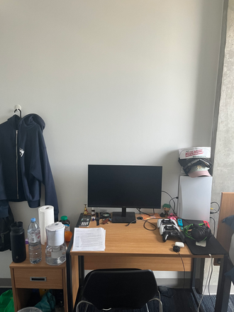 Desk - Campusone. A furnished room with 3 other roommates, sharing one bathroom with one other person.