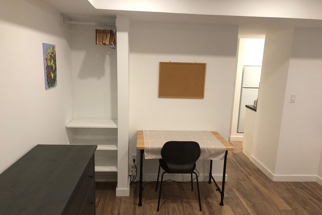 closet, desk and bureau - All inclusive Furnished Basement Studio Apartment near Christie Subway