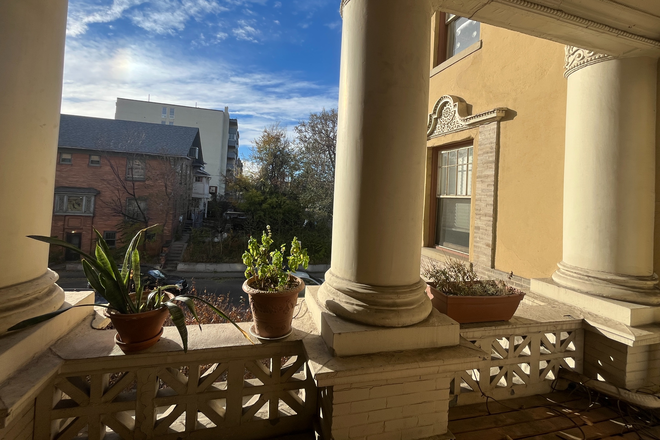 front porch - Charming historic apartment, 2 bedrooms available, no smoking