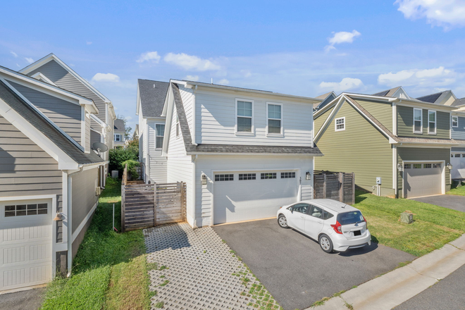 Outside Street View - Rear House - Modern 1BR Apartment w/Office close to campus - Furnished, All Utilities, Patio & Fiber Internet