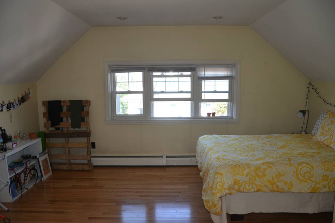 Bedroom (new condo grey paint!) - Beautiful sunlit huge apartment with front and back porch.