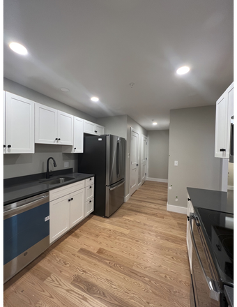 Kitchen - Newer Construction — Modern Student Living Near UVM & Downtown! Apartments