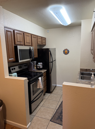 Kitchen with new large microwave - Copper Star Condominium 1bd/1bath  Nicely furnished