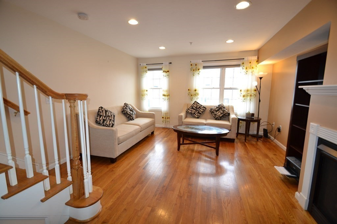 living room - Very large 2 bed/1.5 bath apartment available 11/1/24!! Laundry in unit and parking included!!