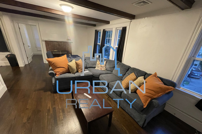 Living Room - **NOW RENTING JUNIOR YEAR 2026-2027**  **LARGE 4 BED 2 BATH**  **CENTRAL AIR**DECK**NEXT TO CAMPUS** Apartments