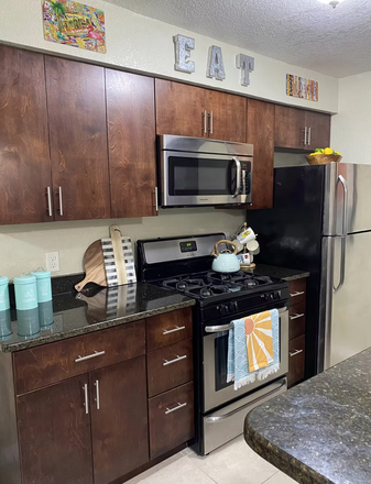 Kitchen- model home image from webiste - College Town at USF Apartments