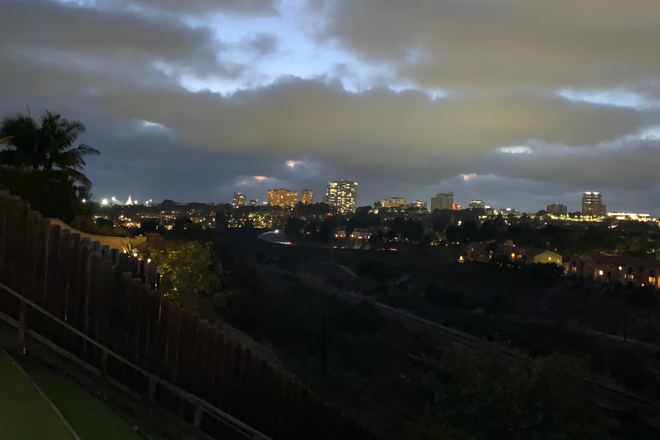 Backyard night view - 4 BR House with Fantastic View looking for 1 more to share