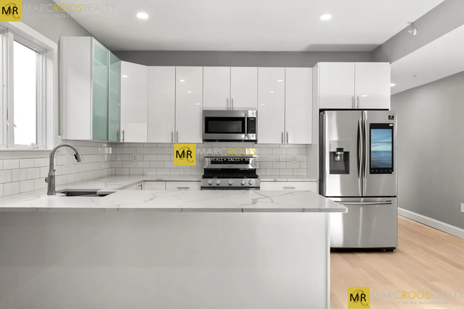 Call NOW for showings! 617-236-8600 - WEBSTER ST - LUXURY RENOVATION! 4BR/2BA ON WATERFRONT NEAR MBTA FOR *9/1/2025* W/ IN UNIT LNDRY! Apartments