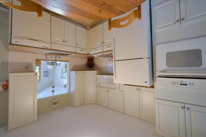 Kitchen - Private Corner House with Ample Parking.  Quite neighborhood.