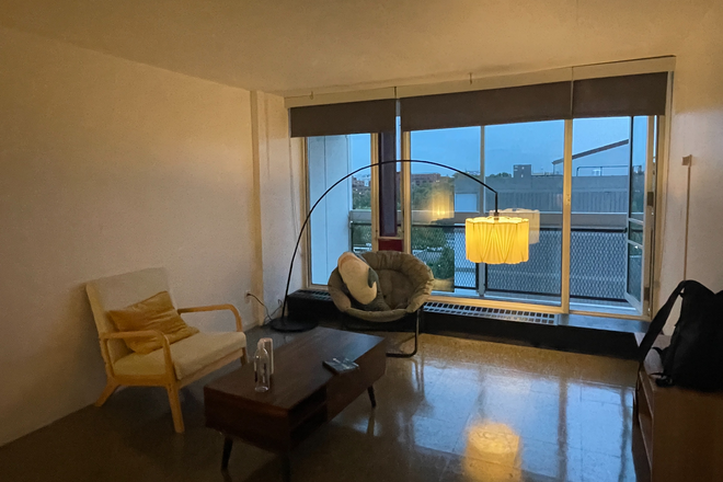 living room - Bright, spacious and furnished 2B1B Peabody Terrace apartment with a river view