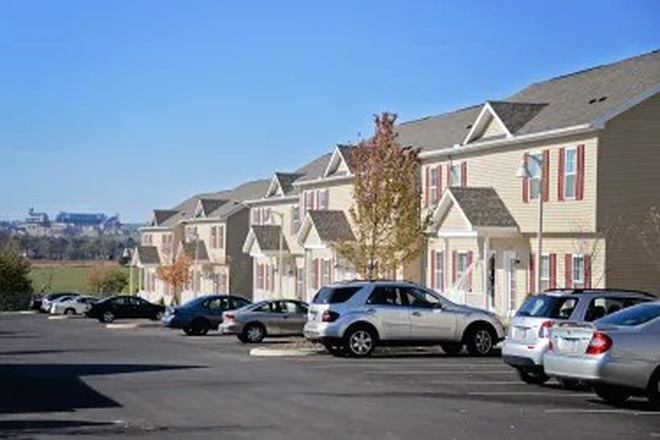Outside view of the town homes, parking areas can be seen - Villas at Happy Valley, Shared Town Home, Private Bed/Bath