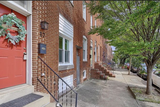 front door - Stunning Upper Fells Townhome with 2 Bedrooms, Rooftop Deck, and 2-Car Parking