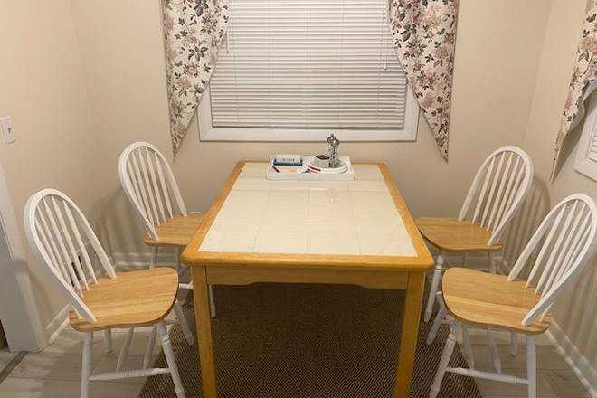 Dining Area - Available for a group of4! 4 Bedroom home in Bonnet Shores!