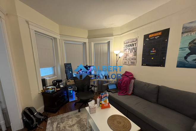 Living Room - Huge Studio with Alcove!! No Broker Fee or Security Deposit!! Apartments