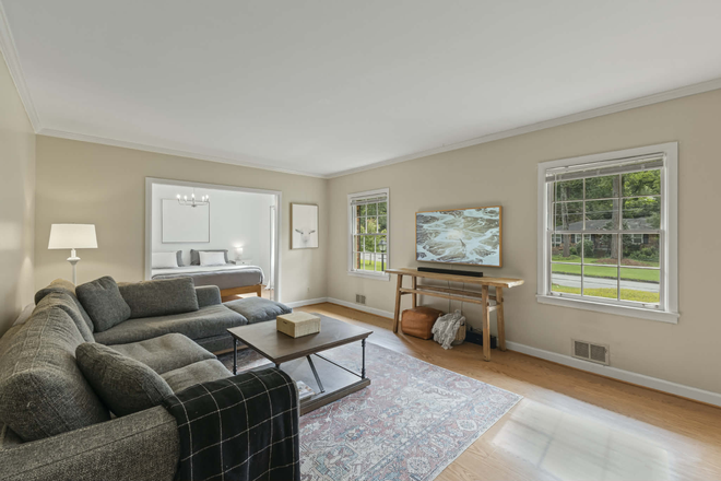 Large bright living room with huge sofa and luxury Frame TV - Huge Quiet 1br with office, large living room, full kitchen