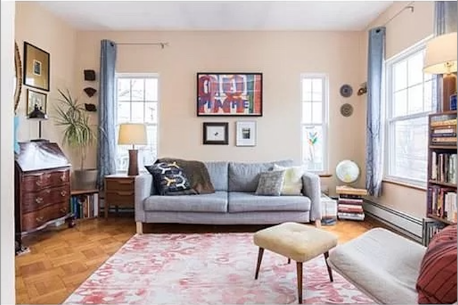 Living room - Sunny 1BR apt in Winter Hill, steps from the new Green Line!