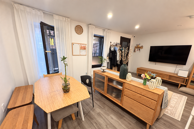 Living room & Dinning room - Owner-Quality Furnished Garden Duplex | 1,450 SF | 2BR + Flex | Private Backyard Duplex