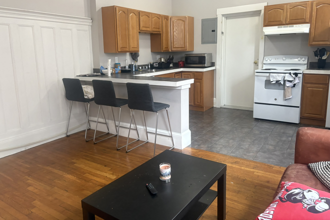 OPEN CONCEPT Living Room/Kitchen - 1066 Commonwealth Ave - RENOVATED OFF CAMPUS HOUSING!! HUGE BEDROOMS!