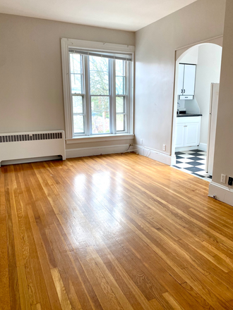Living Room (pictured empty) - Sunny One Bedroom, 1 Bathroom Apartment. Heat and Hot Water Included. Walk to Brown University.