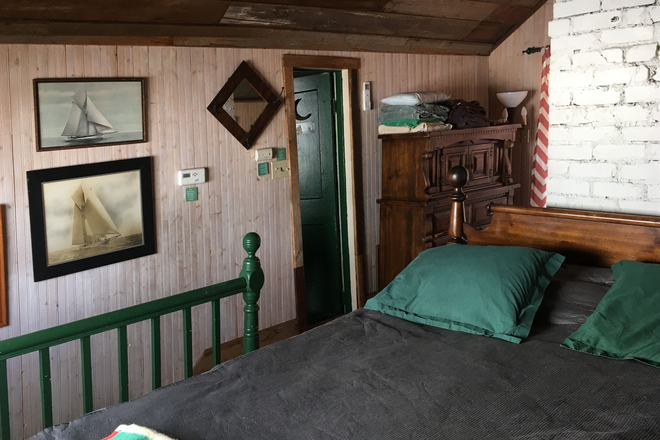 Bedroom View - Cottage on Eagle Lake Apartments